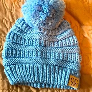 Girls size CC Beanie blue knit stocking cap. NWOT